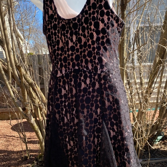 Disney Minnie Rocks the Dots black w/light pink lace dress size large
Pre loved - Picture 3 of 7